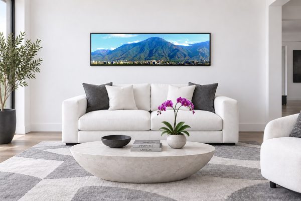 Guardian Ávila panoramic canvas print of El Ávila mountain in Caracas, Venezuela, displayed above a white sofa in a modern living room.